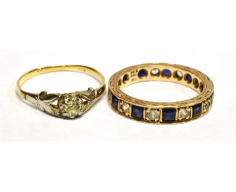 AN 18CT GOLD DIAMOND SET RING AND A 9CT GOLD BLUE AND WHITE GEM SET ETERNITY RING  The 18ct gold ring, set with a small diamo