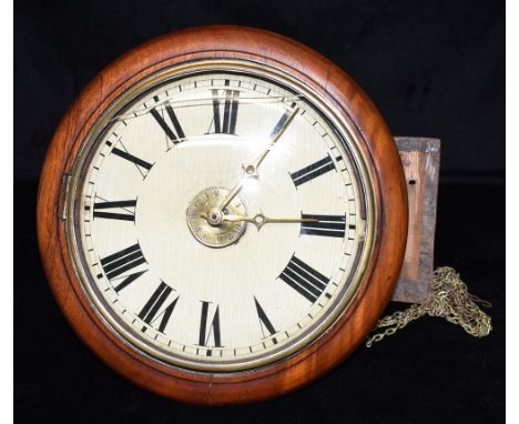 A 19TH CENTURY POSTMANS ALARM CLOCK  the dial with Roman numerals, 30cm diameter overall