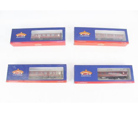Four Bachmann OO gauge coaches. Including a Brake Second Corridor 39-076F, in the original boxes