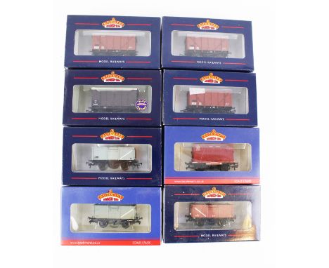Eight Bachmann OO gauge wagons. Including a 38-171 12 Ton British Railways Plywood Vent Van, a 37-377E 16 Ton Mineral Wagon, 