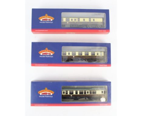 Three Bachmann OO gauge British Railways coaches. Comprising a 39-129B Composite Corridor, a 39-079C Brake Second Corridor an