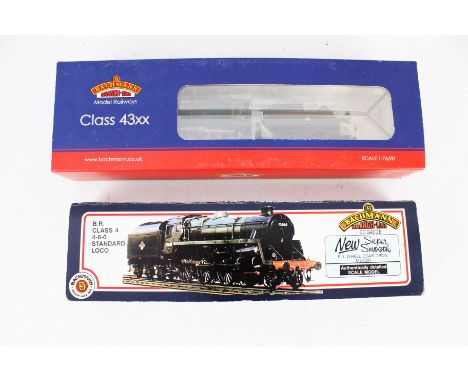 Two Bachmann OO gauge steam locomotives and tenders. Comprising a 31-101 in green livery 75023 and a 31-831 in British Railwa