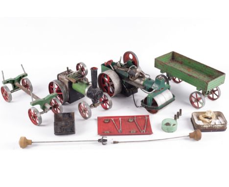 A collection of Mamod live steam vehicles and trailers. Featuring one steam roller (with repair on left side), one traction e