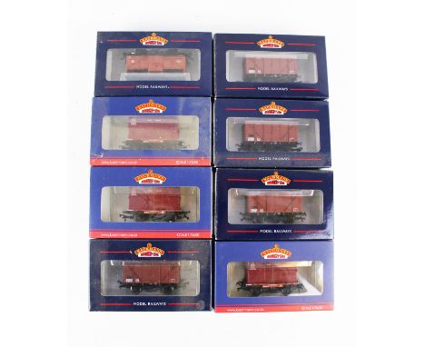 Eight Bachmann OO gauge box car wagons. Including a 37-951 Conflat with BD container, 38-171 12 Ton Plywood Vent Van, etc, in