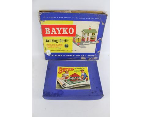 Two boxed Bayko buildings sets. Comprising a no 14 Building Outfit and a Bayko Building set no 422645, both unchecked for com