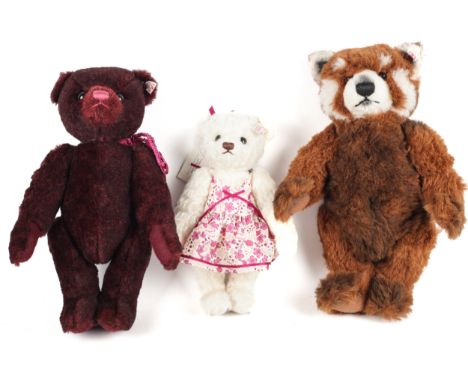 A collection of three Steiff teddy bears. Comprising one with Liberty Art Fabrics, one Red Panda Ted with sound box and one A