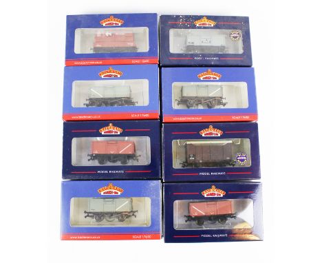 Eight Bauchmann OO gauge Bachmann wagons. Including 37-930A 3 Plank Wagon, 37-377E 16 Ton Mineral Wagon, etc. in the original