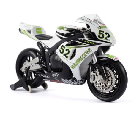 A Minichamps diecast Honda CBR 1000 RR Fireblade Motorcycle. 1:12 scale, in the original box with certificate of authenticity