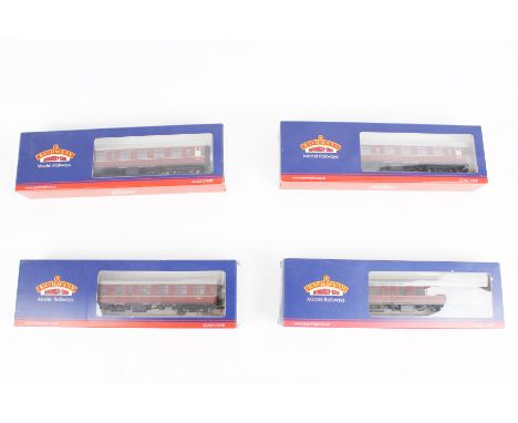 Four Bachmann OO gauge coaches. Comprising three 39-026G MK1 SK Second Corridor coaches and a 39-026H MK1 SK Coach, in the or