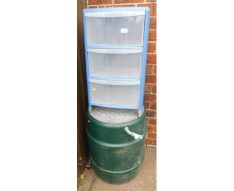 A plastic garden water butt, together with a three drawer plastic chest. 
