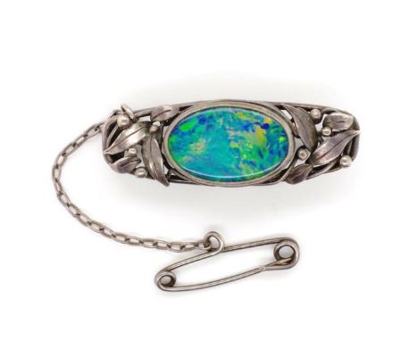 Australian Arts &amp; Crafts silver brooch set with a single backed opal. Unsigned. In the Wager manner probably Dorothy M Wa