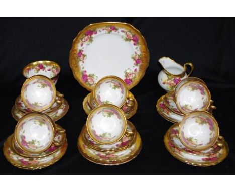 Extensive Royal Chelsea 'Golden Rose' coffee set including 12 cups, saucers, and side plates, cream jug, and sugar bowl, and 