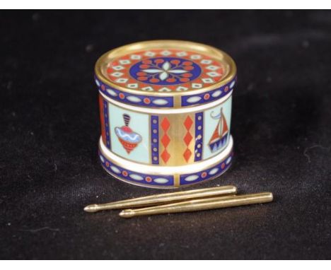 Royal Crown Derby 'Toy Drum' ceramic piece 'Treasures of Childhood,' series, with drum sticks, (height 4cm approx).