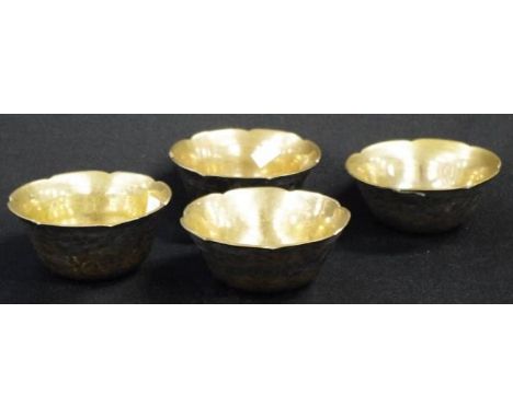 Four Chinese brass ceremonial tea cups diameter 10.5cm approx