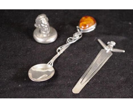 Three various Australian sterling silver pieces including coffee spoon, with applied floral decoration to handle, and inset a