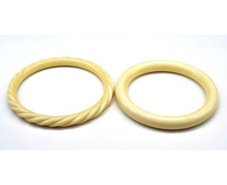 Two vintage Ivory bangles c.1950s This item may not be exported without CITES documentation.