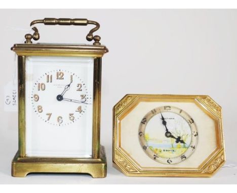 Waltham art deco bedroom clock with gilt metal case and scenic dial. 8 Days, working when tested. Together with a small brass