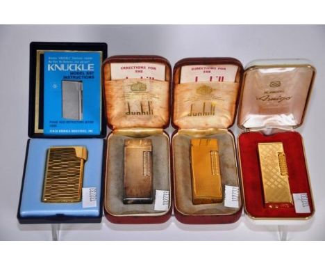 Two vintage Dunhill lighters cased together with 2 other cased lighters