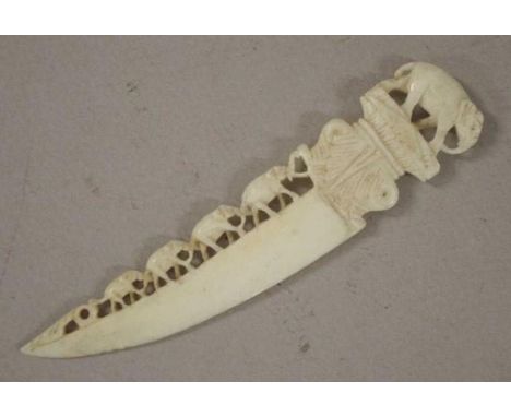 Vintage Oriental Ivory elephant form letter opener elephant finial, with bridge of elephants decoration, (length 10cm approx)
