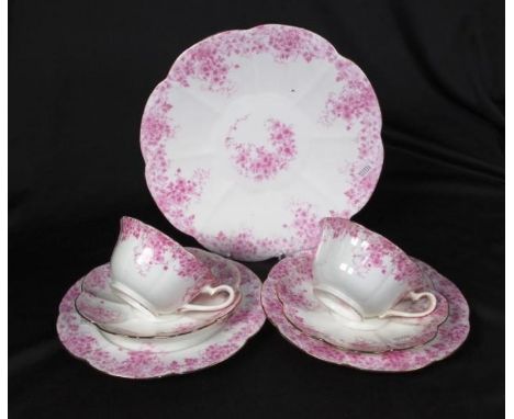 Two Wileman trios and a cake plate. marked to bases and # 5652, Rd 270002, (Trailing Violets Print), introduced October 1895.
