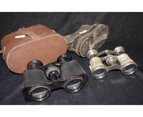 Pair of vintage mother of pearl opera glasses together with a pair of binoculars glasses, both in original cases