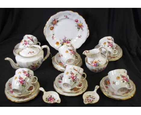 Thirty eight piece Royal Crown Derby teaset 'Derby Roses,' pattern, including 12 teacups, 9 saucers, sugar bowl, milk jug, 11