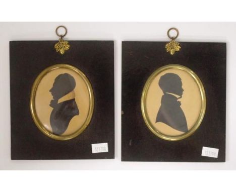 Two framed Georgian silhouette portraits each a silhouette portrait of a Gentleman, (8.5cm X 7cm approx, each), in original b