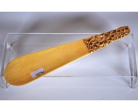 Antique Chinese ivory shoe horn decorated with a serpent, 20cm long approx., C:1900, NB This item cannot be exported.