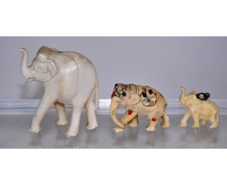 Three vintage ivory figures of elephants largest is 5.5cm high approx., C:1950, This item cannot be exported.