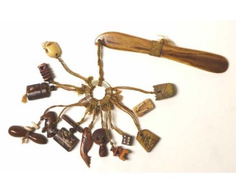 Vintage Oriental carved collection souvenir charms a collection of approximately 12 carved charms, all strung together with p