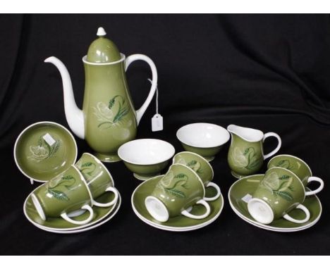Sixteen piece Susie Cooper coffee set including 6 each cups and saucers, coffee pot, sugar bowl, (plus 1 extra, cracked), cre