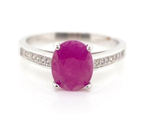 Ruby and sterling silver ring marked 925. Approx 9.1mm x 7.5mm treated ruby, ring size O-P