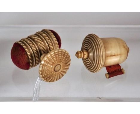 Victorian carved ivory pin cushion together with a acorn shaped tape measure, This item cannot be exported.