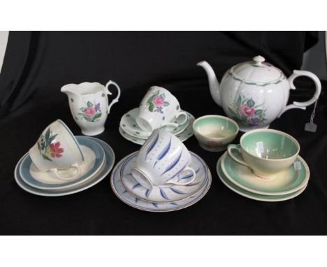 Seventeen pieces Susie Cooper ceramic tableware including matching teapot and cream jug; 3 various trios; and a pair cups and