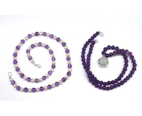 Two amethyst beaded necklaces includes one with a jade set silver pendant, approx length 55cm. As well as a alternating pearl