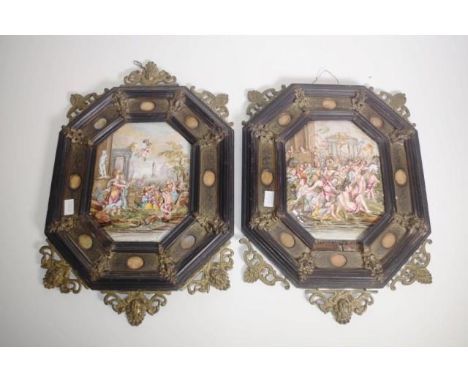 Pair antique Capodimonte ceramic plaques each of a classical scene in relief and in early wood and brass decorated frames, ( 