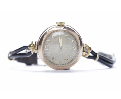 LADY'S NINE CARAT GOLD MANUAL WIND WRIST WATCH
signed CYMA 15 jewels movement, the round machined dial with applied gold colo