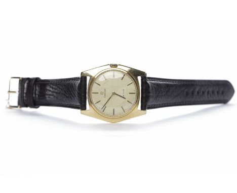 GENTLEMAN'S OMEGA DE VILLE EIGHTEEN CARAT GOLD  WRIST MANUAL WIND WATCH 
620 calibre movement, the round champagne dial with 