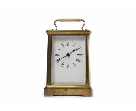 FRENCH BRASS CARRIAGE CLOCK
the enamelled dial with Roman numeral dial and blued steel hands, platform escapement, the moveme