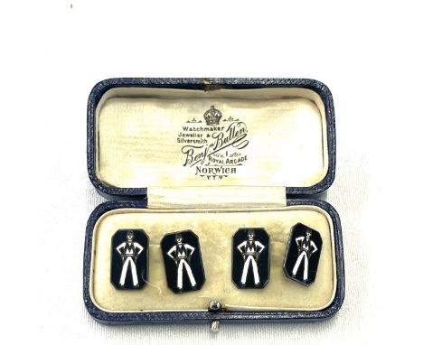 Pair of unusual art deco period silver and enamel cufflinks - stylised man design 