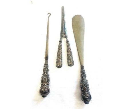 Hallmarked silver handled glove stretchers, button hook and shoe horn 
