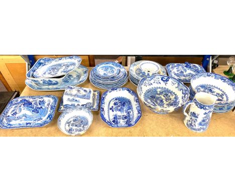 Large shelf of blue and white pottery includes jugs, cheese dish etc 