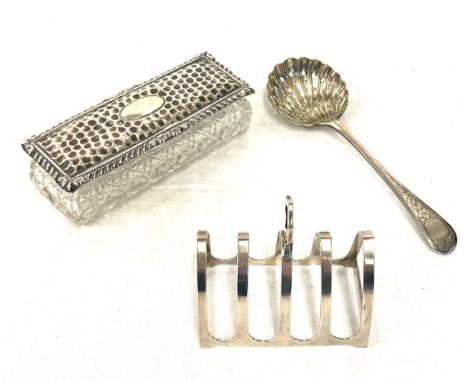 Hallmarked silver toast rack, strainer spoon and silver top glass trinket, approximate silver weight 119g 