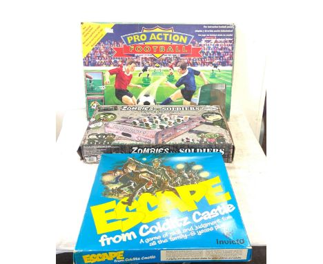 Selection of vintage and later games to include Vintage Escape from Colditz castle, Zombie football game, Pro Action football