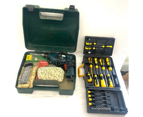 Selection of cased tools includes kd562 black and decker drill and a JCB screw driver and socket sets 
