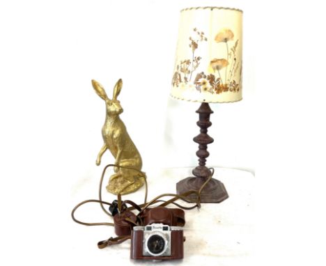 Assortment of items to include wooden table lamp,  hare ornament, vintage camera Paxette, untested 