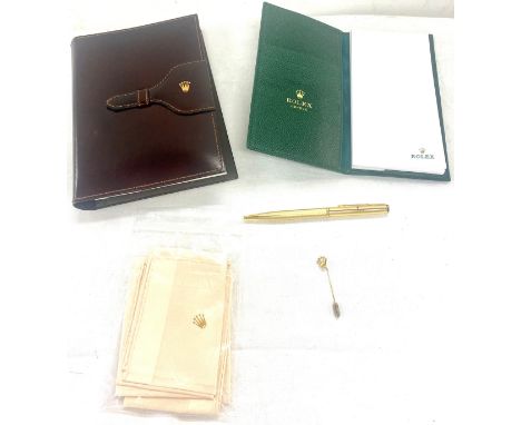 Rolex gold tone blue ball point pen, Rolex tie pin, 2 Rolex hankies, Rolex green leather note pad, Brown leather Rolex notepa