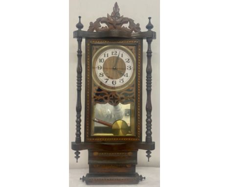 Antique Americian drop dial wall hanging clock with pendulum, original mechanism has been replaced however the original parts