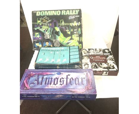 Selection of vintage games to include interstate game consol, atmosfear video board game, domino rally ghost ride, quotations