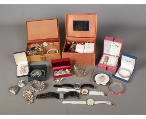 A box of assorted costume jewellery and accessories to include bracelets, wristwatches, Stratton compact and tie slides, etc.